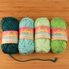 image:imageJubileeYarn Delightfully Plump Yarn  100gSkein Super Chunky Bamboo Rayon  Shades of Purple  4 SkeinsShades of Green