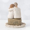 image:imageWillow Tree Anniversary Sculpted HandPainted Cake Topper  Cast from a Susan Lordi Original Carving Carved Flower Base LeadFree and FoodSafe Materials Sentiment on Enclosure CardAnniversary